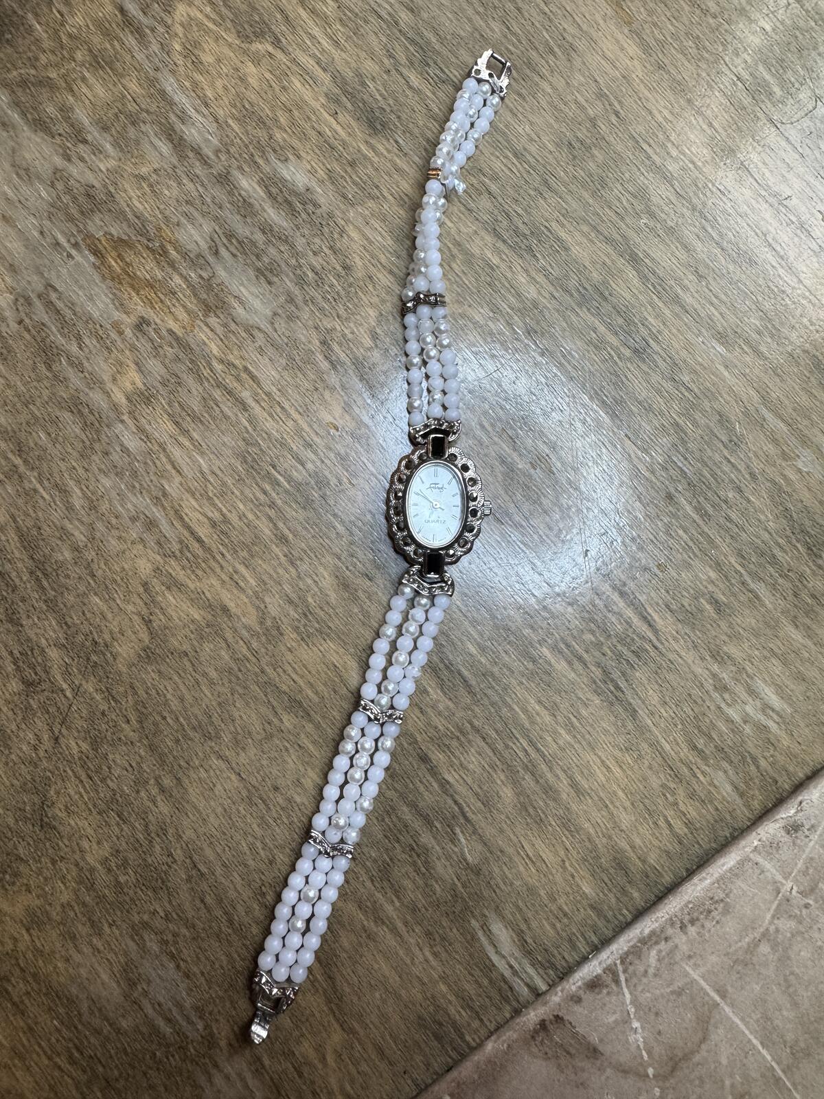 Faberge Ladies Watch with faux pearl bracelet
